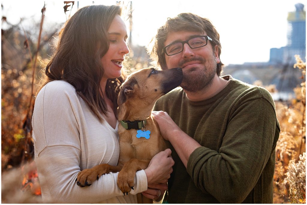 Puppy kisses during a Stone Arch Bridge Family Photography Session