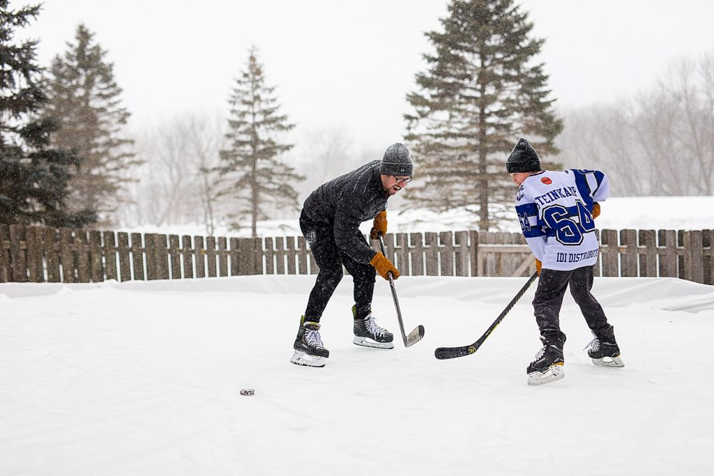 Minnetonka Family Photography - dad and son playing hockey
