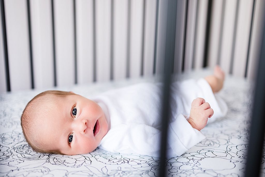 Edina Newborn Photographer - Baby in crib close-up