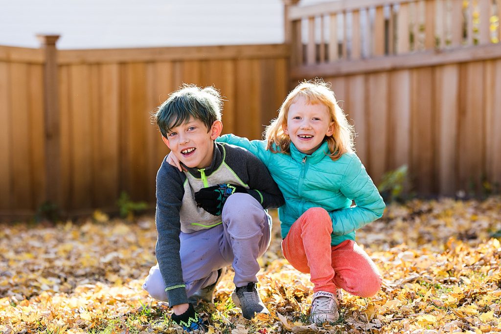 Two kids smiling at Minnesota Family Photographer