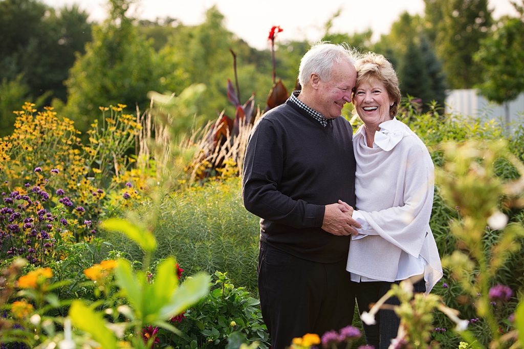 Man and woman smiling at Longfellow Gardens