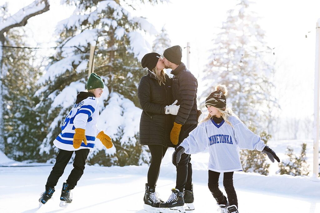 5 fun ideas for family photos in winter include skating for family photos in Minnetonka, MN