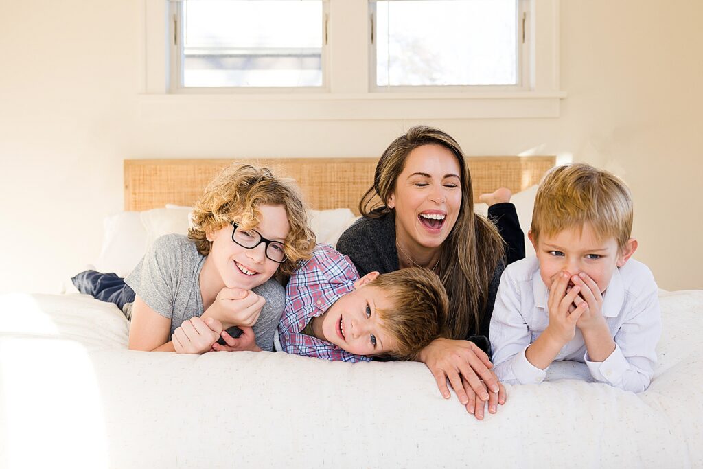 Family with three boys in 7 Huge Reasons to Book Your In-Home Family Photo Session.